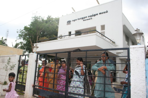 Banyan shared housing residents with health workers.