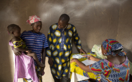 Community Health Worker assessing a child in Mali - Photo courtesy of the Canadian Red Cross