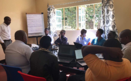 Project Manager, Mr. Adam R. Mbyallu, giving a project overview of Inspire100 project to the team, at Mkwawa Community Art Space in Iringa, Tanzania. Photo credit: Emmanuel Senzighe