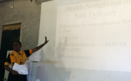 A nurse explaining to the HNs on Anti Natal issues (ANC)
