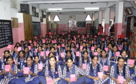 Girls holding Kanya Kits after the training
