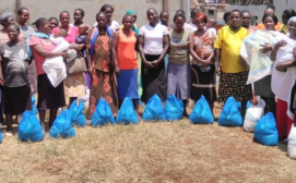 Childslife International - Mothers after receiving a food package outside office in Kibera (Picture by John Maina)