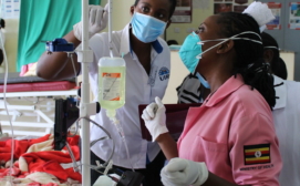 Philippa Makobore – project lead with a clinical study nurse (Winnie Kibirige)