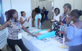 Sist_s Mollyne Otieno and Janet Wali demonstrating how the Miracradle is used at the Kenya Pediatric Association Annual Scientific Conference-Photo Credits Ordia Akello